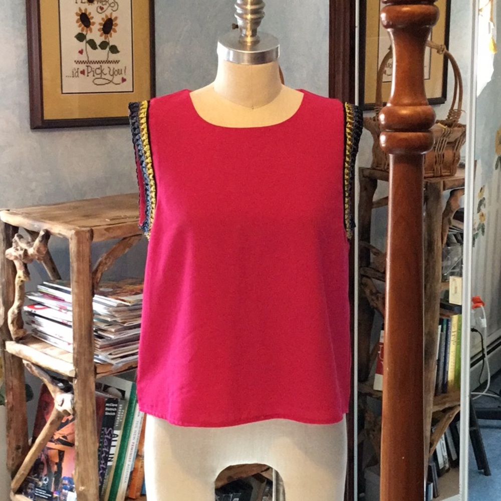 Deep pink top with beading around armholes
